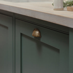 Transform your kitchen cabinets with these stunning brass handles.
